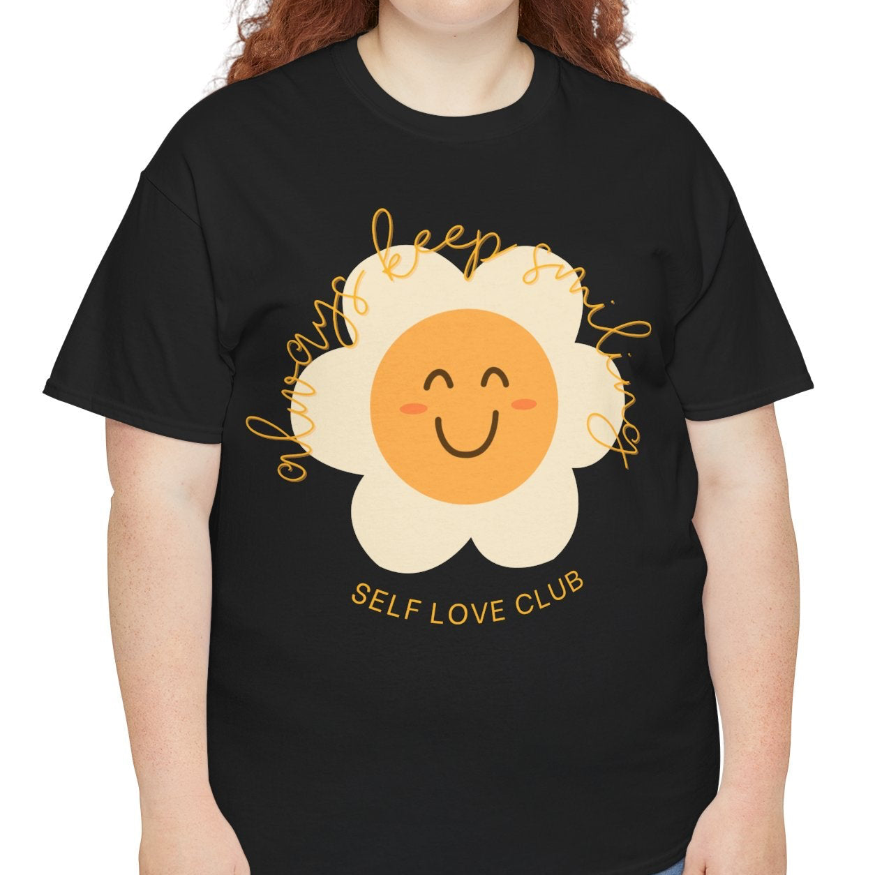 Person wearing a black t-shirt with a flower graphic and 'Self Love Club' text on a white background