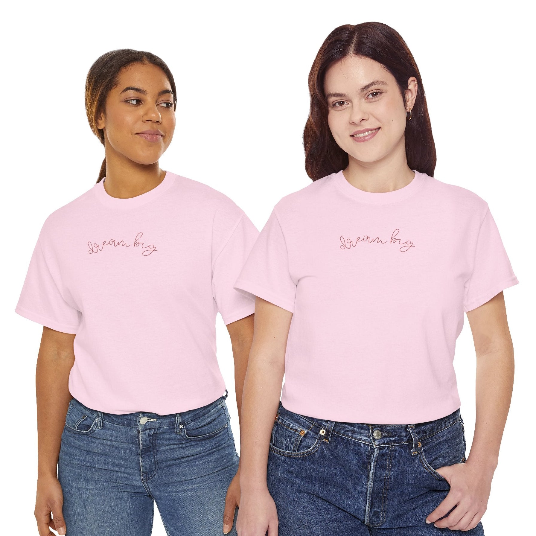 Two women wearing pink t-shirts with "dream big" text on a white background