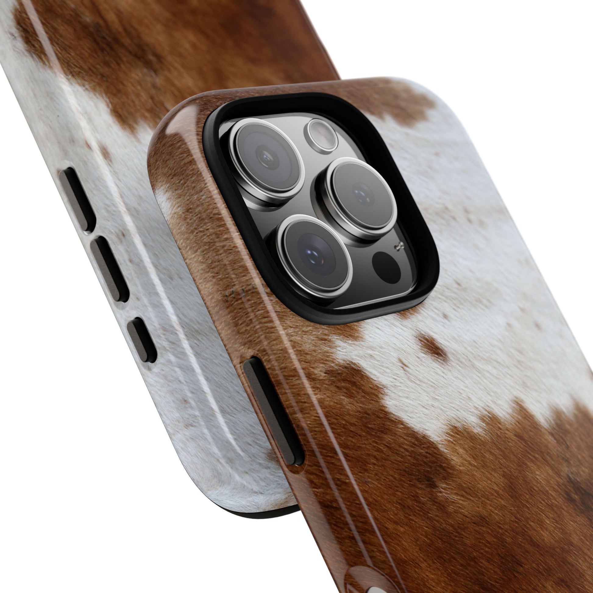 Phone case with cow print design on a white background