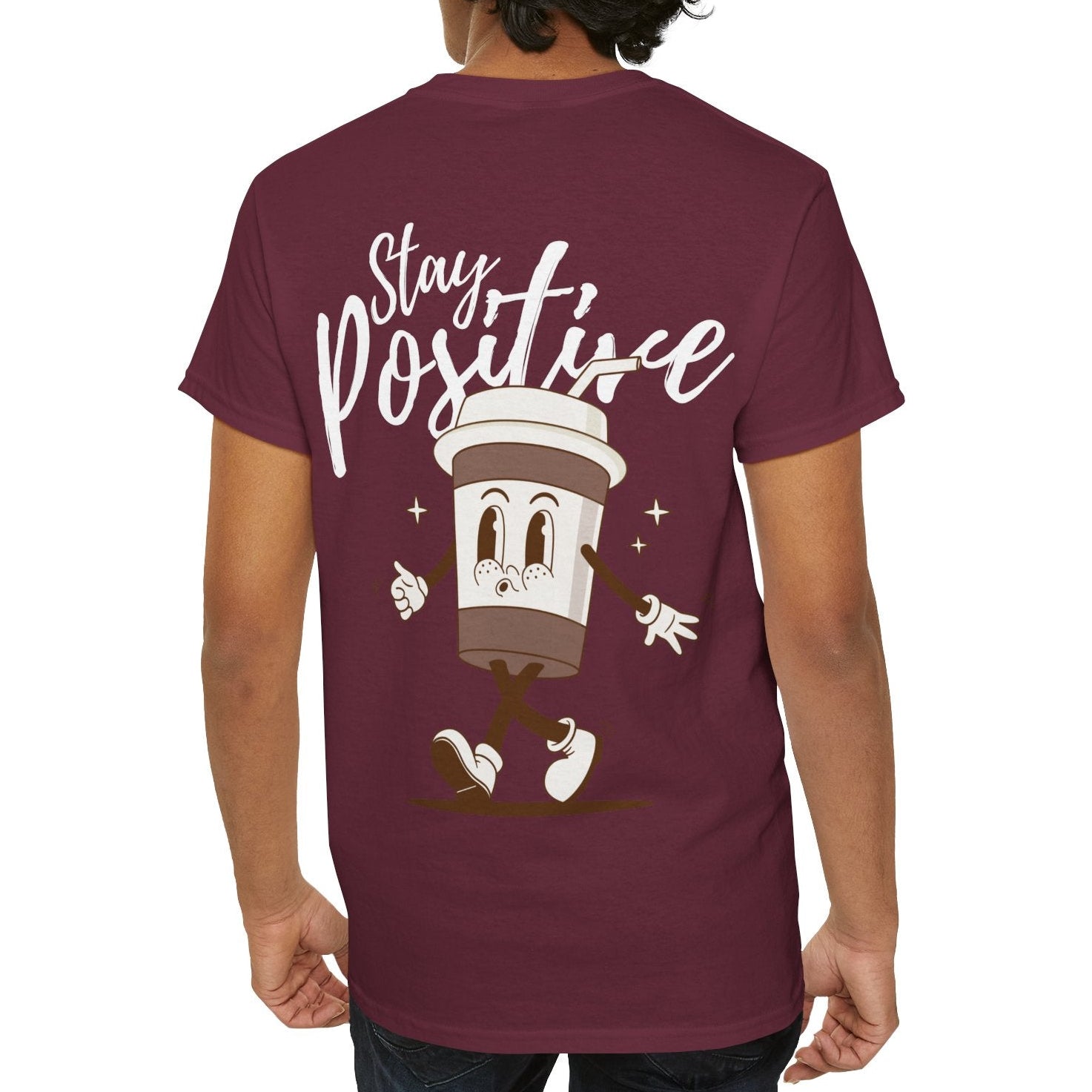 Person wearing a maroon t-shirt with a graphic design and text on the back