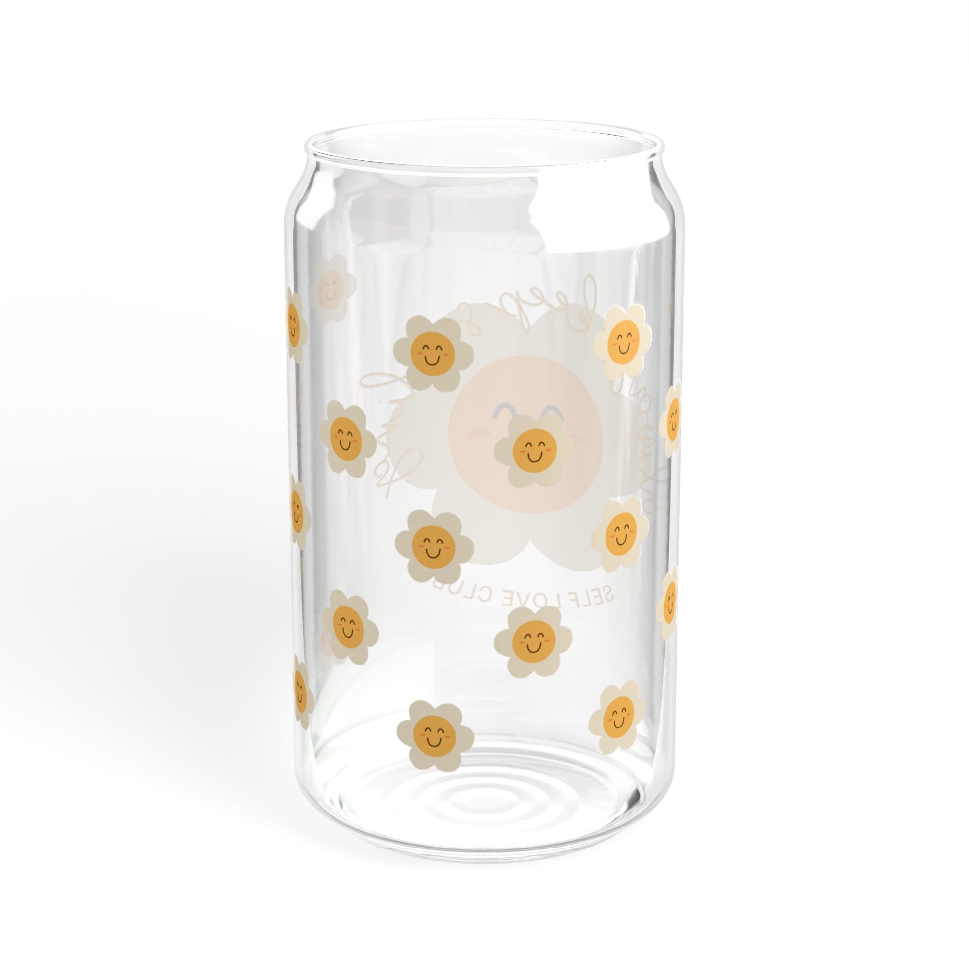 Glass tumbler with happy flower designs on a white background