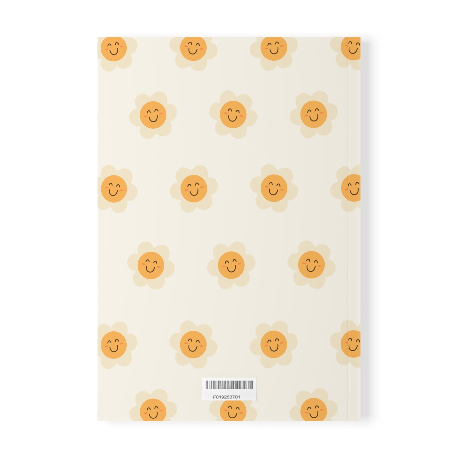 Notebook with happy face and sunflower pattern on a white background