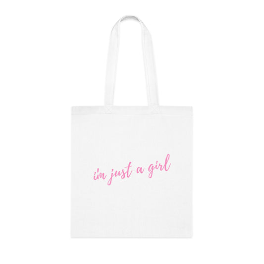 White tote bag with 'i'm just a girl' text in pink on a white background